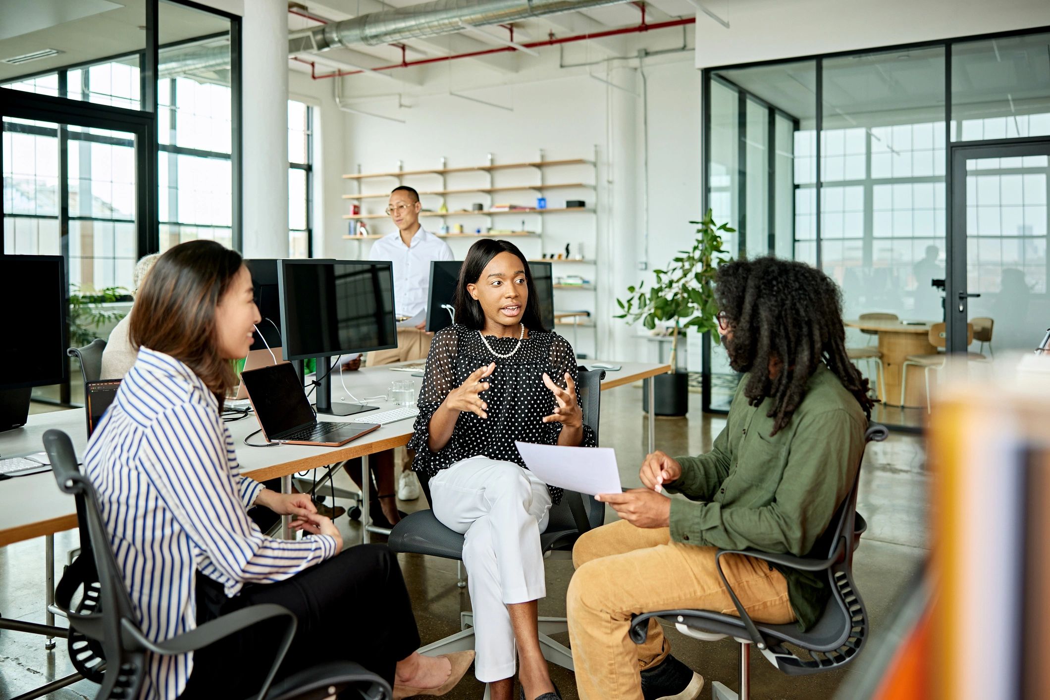 Small team collaborating in a modern office
